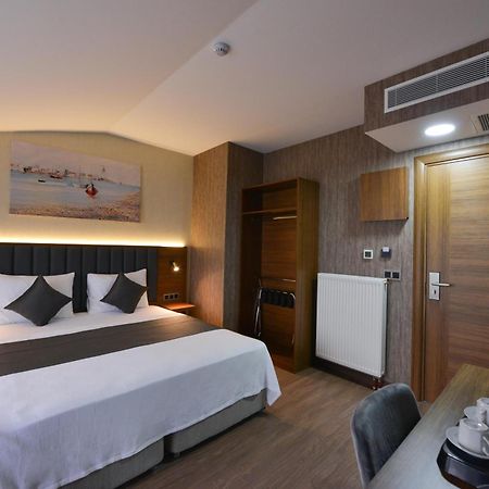 Istport Garden Hotels Arnavutkoy Exterior foto A room at the hotel